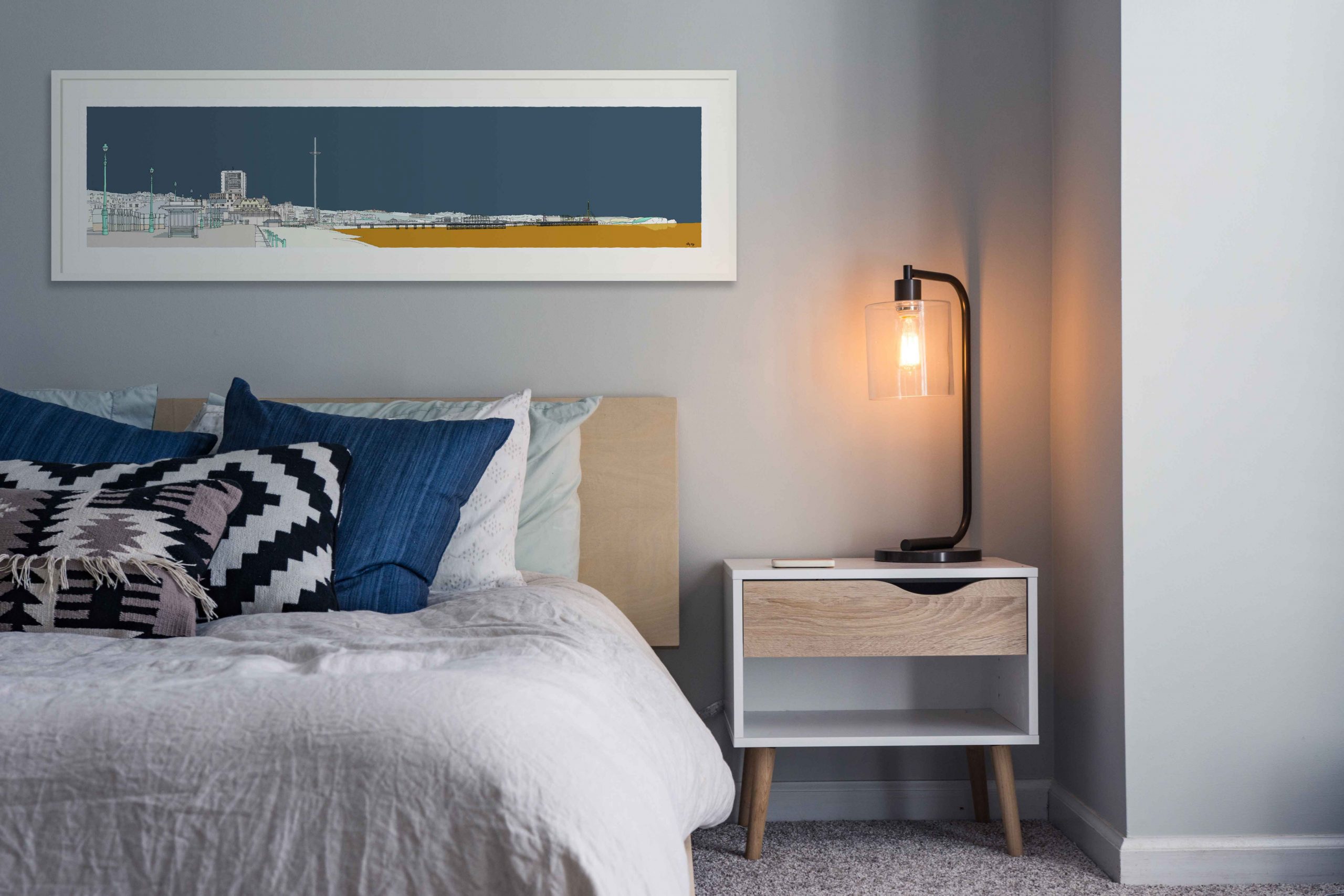 room with panoramic print named Hove Brighton Beach Promenade Antique Blue and Ochre by artist alej ez